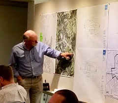 Bill Tunnell talks through how City Hall Plan might best be used at Charrette